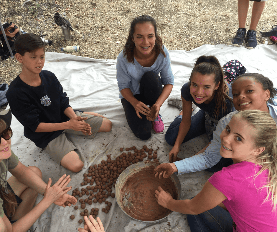ecological restoration children making seedballs