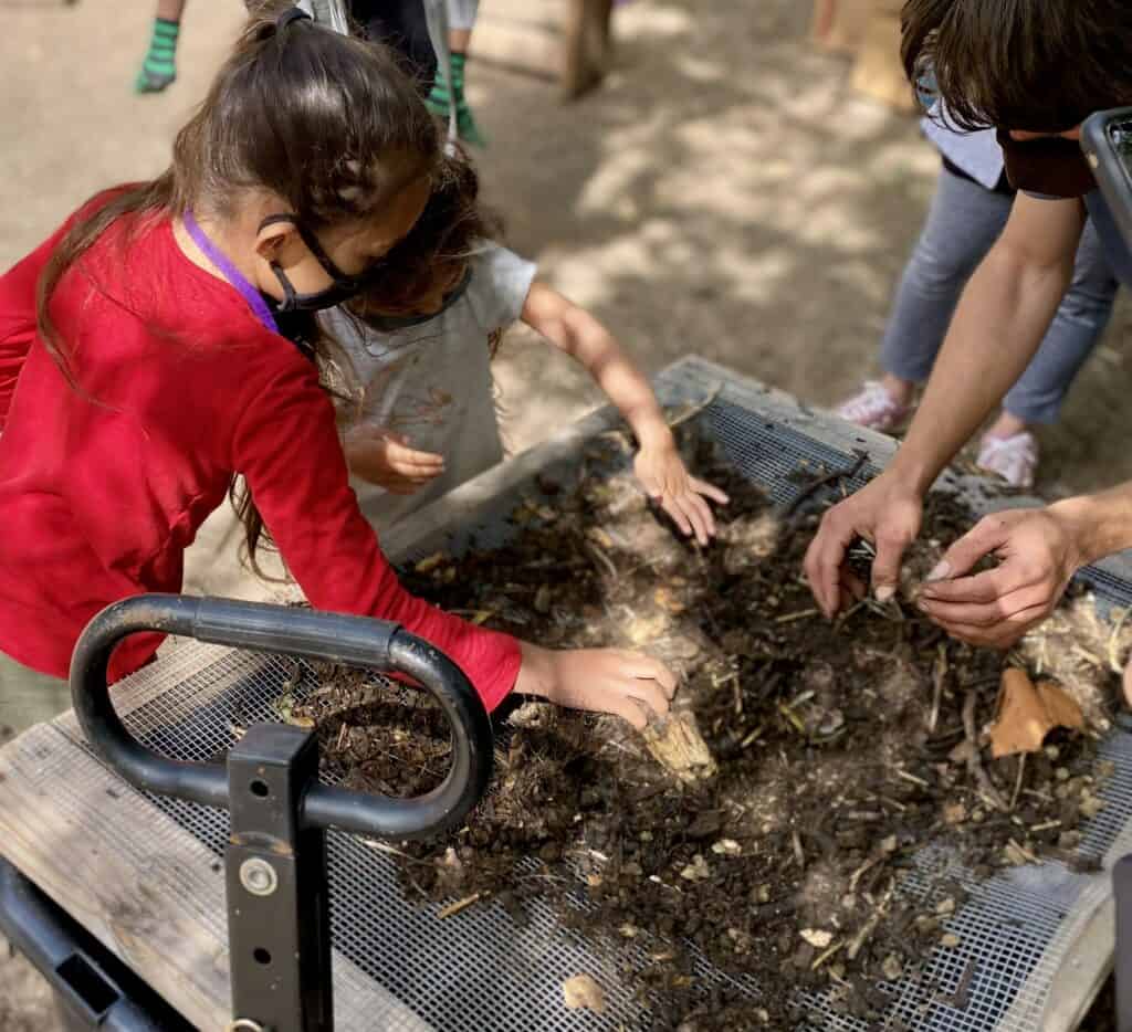 children learning about composting
